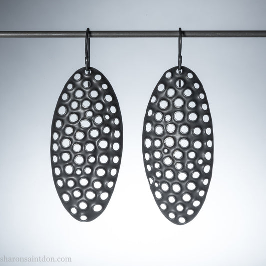 50mm solid 925 sterling silver oval disc earrings, hand-punched pattern, flat matte black oxidized finish, handmade ear wires.