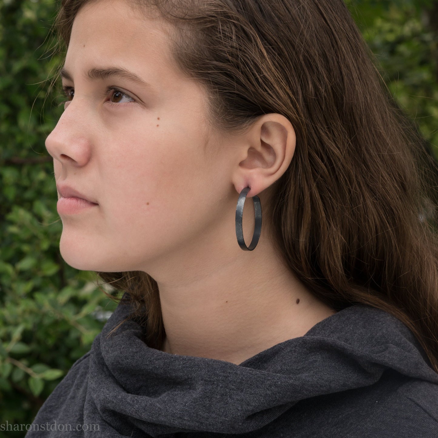 Solid 925 sterling silver hoop earrings handmade by Sharon SaintDon in the USA. 40mm diameter, 5mm wide, Matte shiny finish, hammered wavy texture, sterling silver posts and backs.