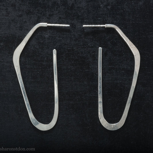 Solid 925 sterling silver hoop earrings, hammered, angular long high D shape. Matte finish.