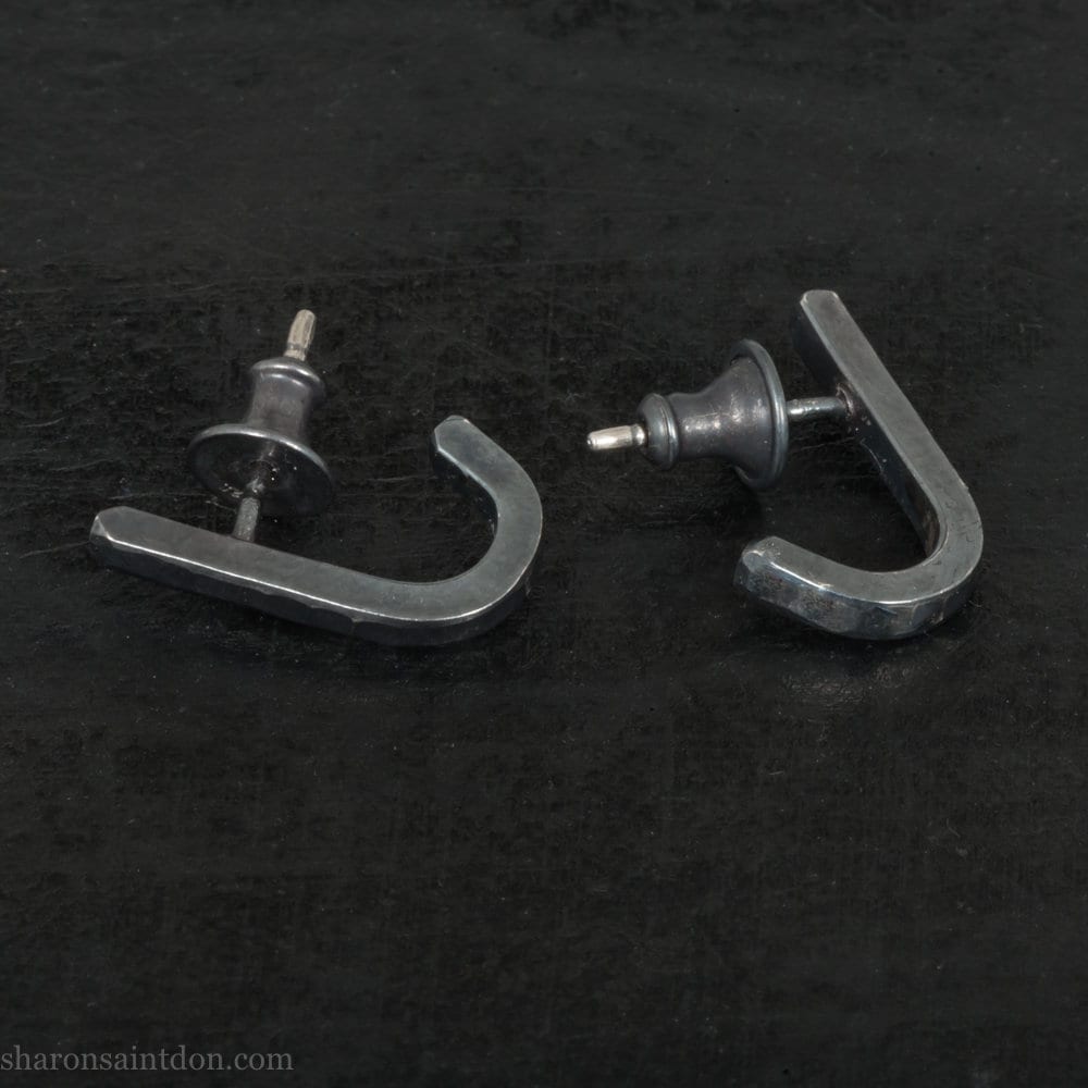 Handmade 925 sterling silver earrings. J wrap, huggie, hammered texture, minimalist, oxidized black earrings made by Sharon SaintDon in North America.
