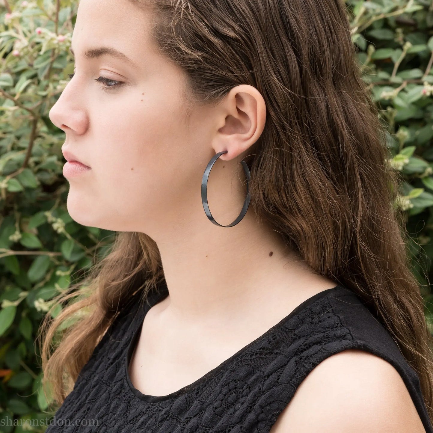 Handmade 925 sterling silver hoop earrings for women. 55mm diameter, 5mm wide, Oxidized black, large hoops for daily wear. Minimalist, comfortable, lightweight with a hammered, texture.