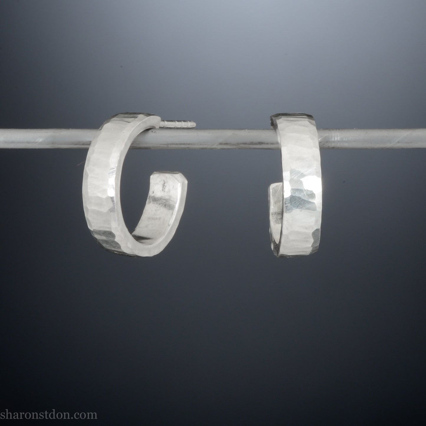 925 sterling silver hoop earrings handmade in North America by Sharon SaintDon. 16mm x 4mm, small, round with hammered texture.