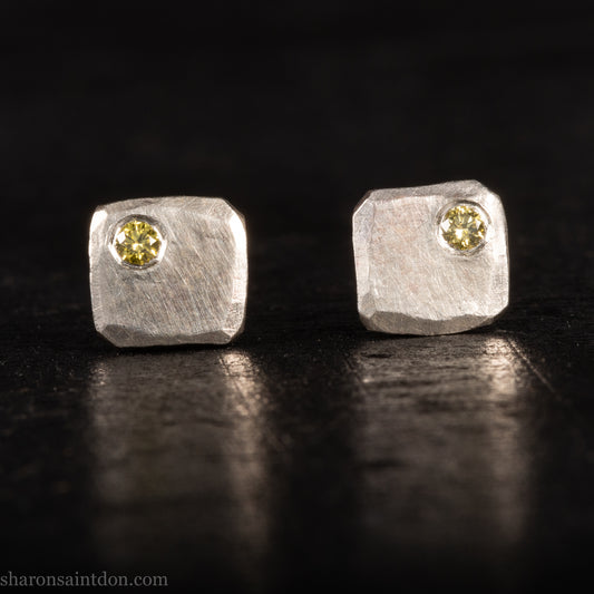 Handmade hammered solid 925 sterling silver stud earrings. 7mm square. matte finish with 2mm round canary yellow diamond set in the corner.