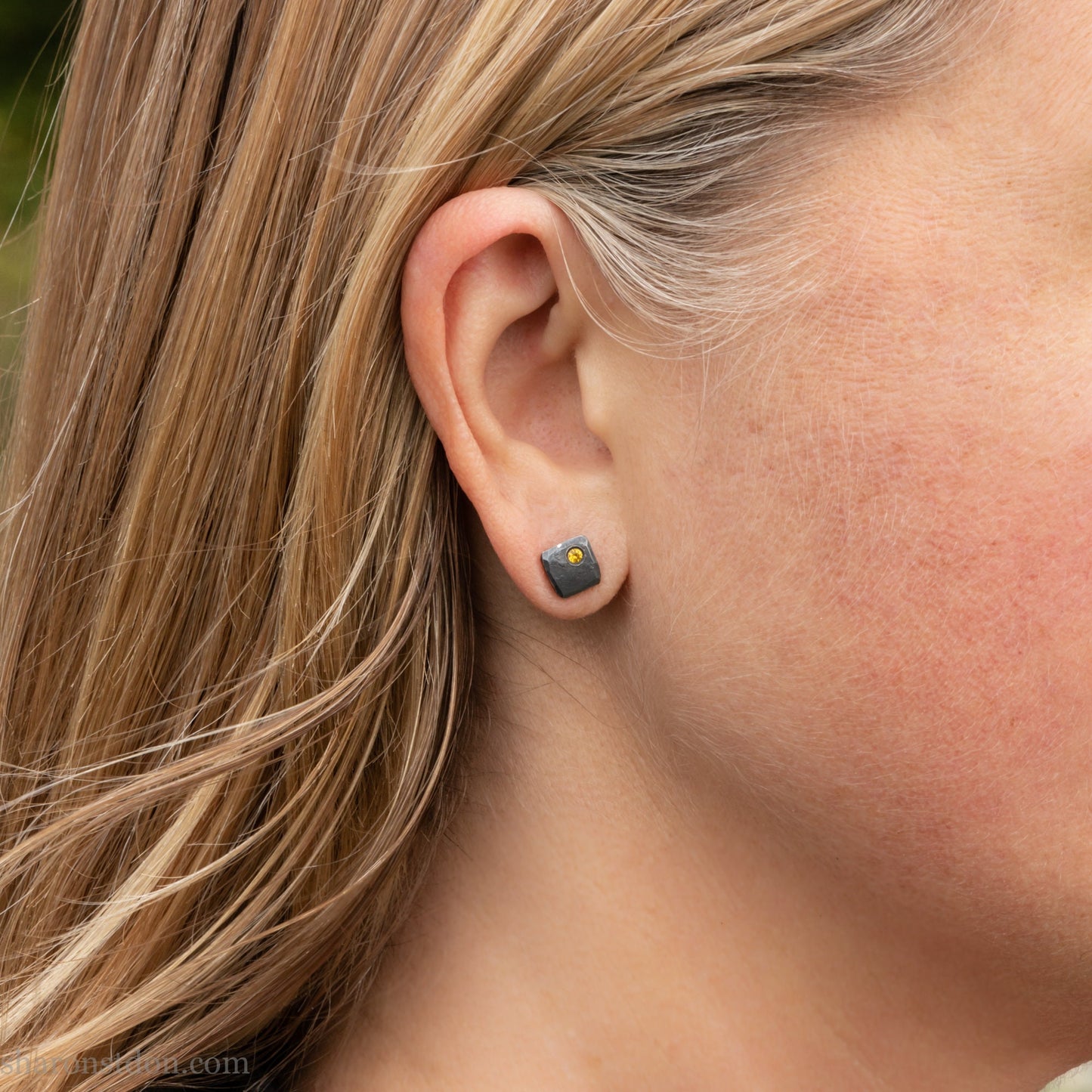 Canary yellow diamond stud earrings. Hammered solid silver with a 2mm round canary yellow diamond, flush set in the corner. 7 x 7mm square x 1.5mm thick, oxidized black. Solid silver posts and  backs. Handmade by Sharon SaintDon in North America.
