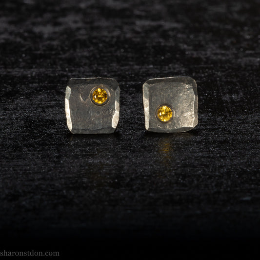 925 sterling silver stud earrings with lab grown 2mm round golden yellow topaz gemstone set in the corner. Oxidized black 925 silver, 7mm square, 1.5mm thick, silver posts and backs. Handmade by Sharon SaintDon in North America.