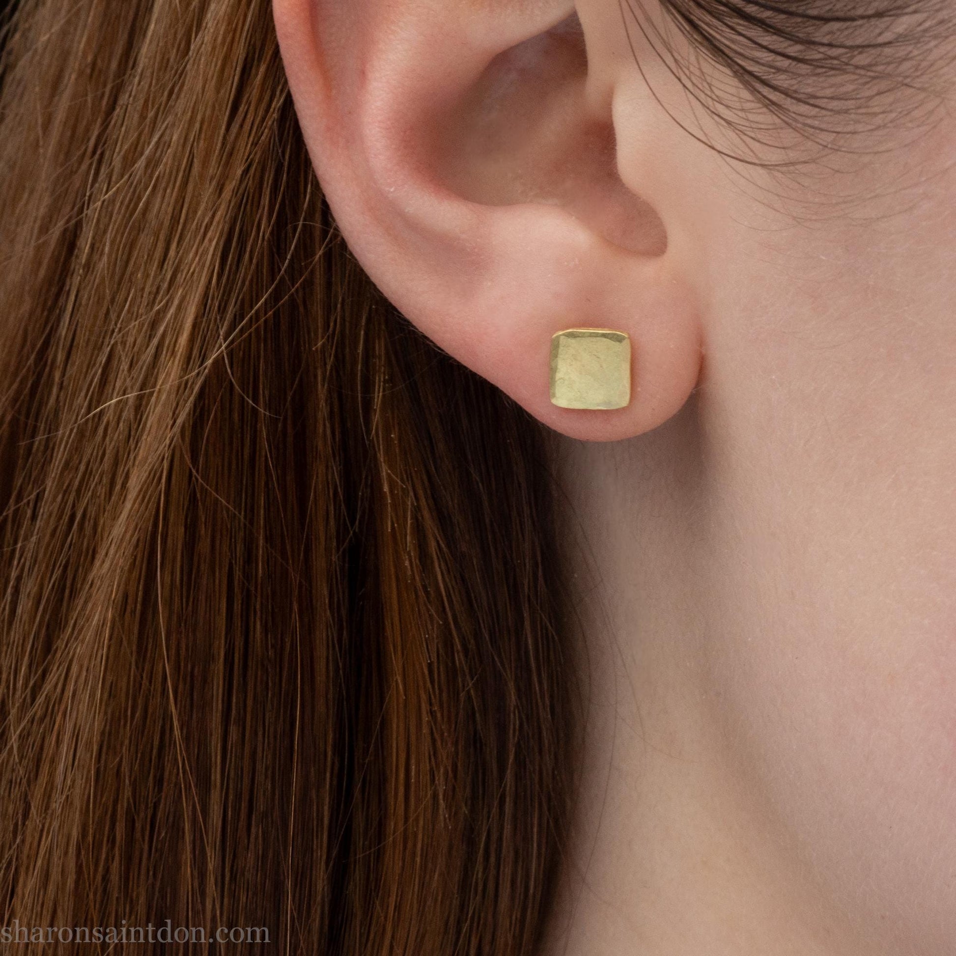 Solid 18k gold stud earrings 7mm square. Hammered with matte brushed finish, solid 18k gold backs.