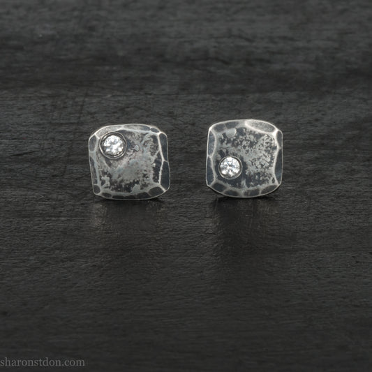 7mm square, handmade 925 sterling silver stud earrings with Canadamark brand Canadian diamond in the corner. Dark, antique finish, Handmade by Sharon SaintDon in North America.