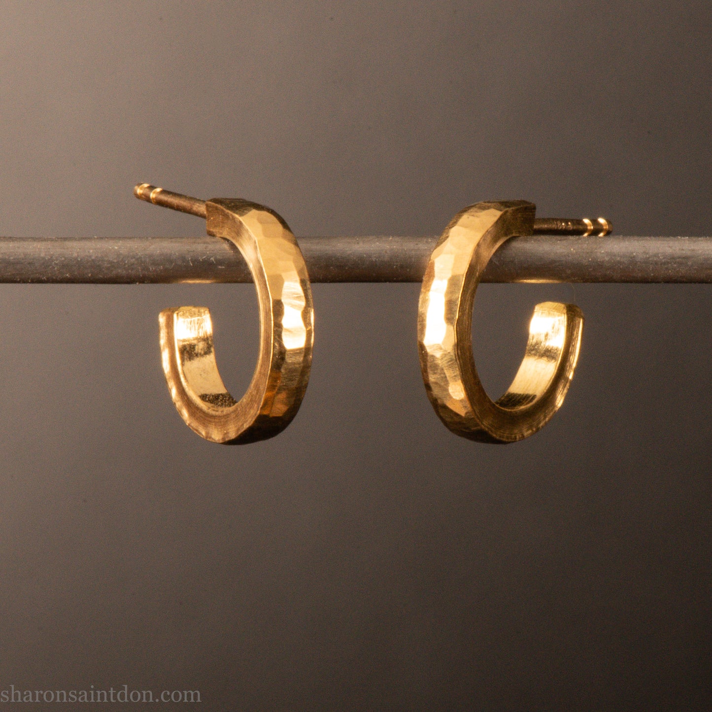 22k yellow gold hammered hoop earrings, 14mm diameter, matte brushed finish.