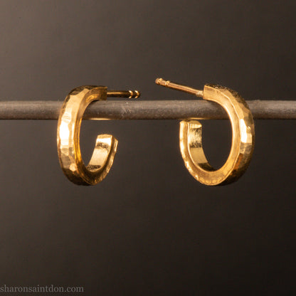 22k yellow gold hammered hoop earrings, 14mm diameter, matte brushed finish.