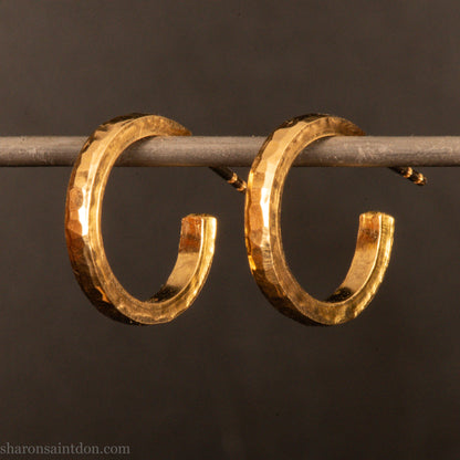 Solid gold hoop earrings, handcrafted hammered finish. 16mm diameter, 2mm wide.