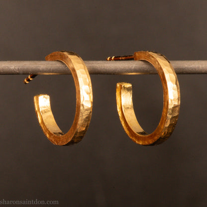 Solid gold hoop earrings, handcrafted hammered finish. 16mm diameter, 2mm wide.
