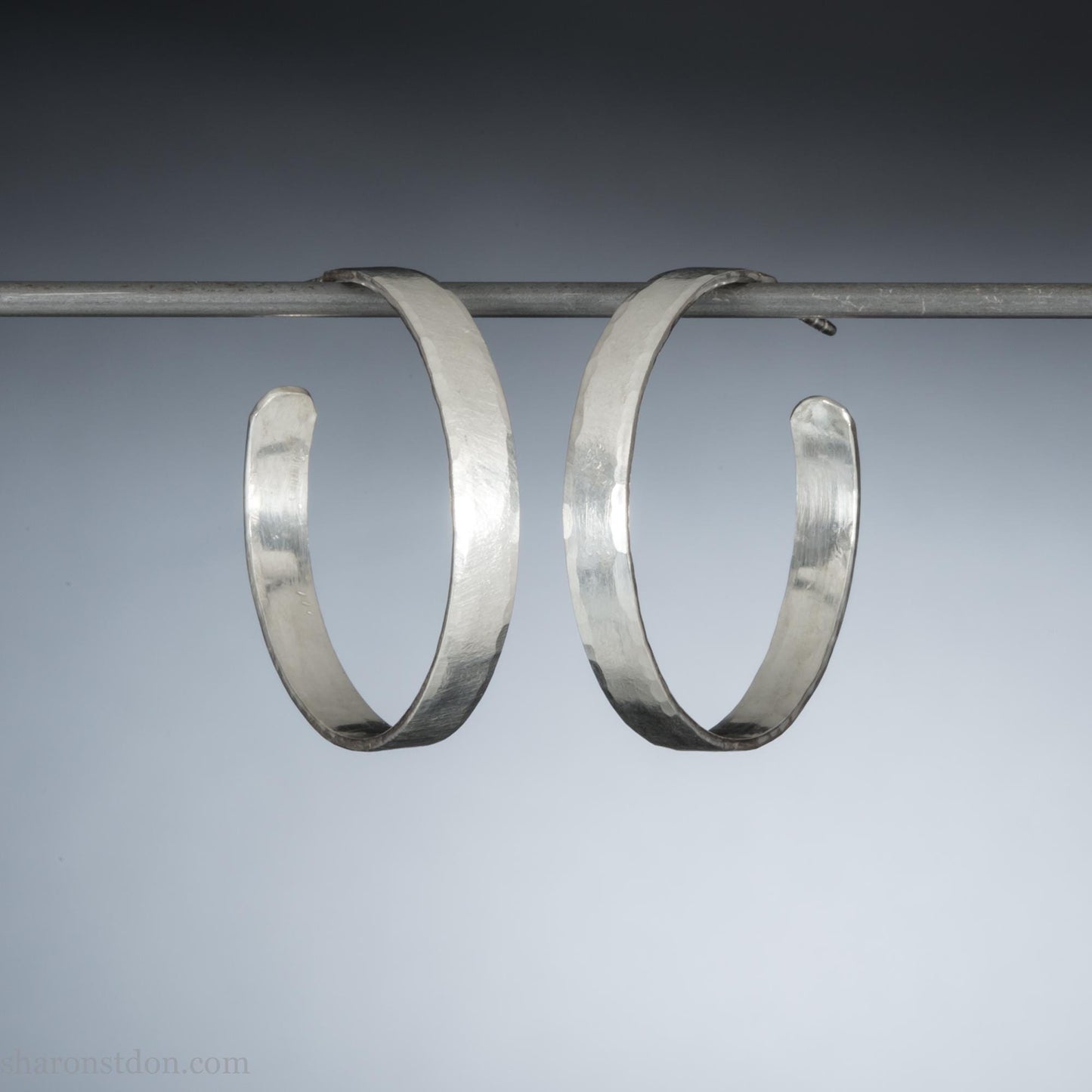 30 mm x 4 mm solid sterling silver hoop earrings, handmade with wavy hammered texture and shiny matte finish.