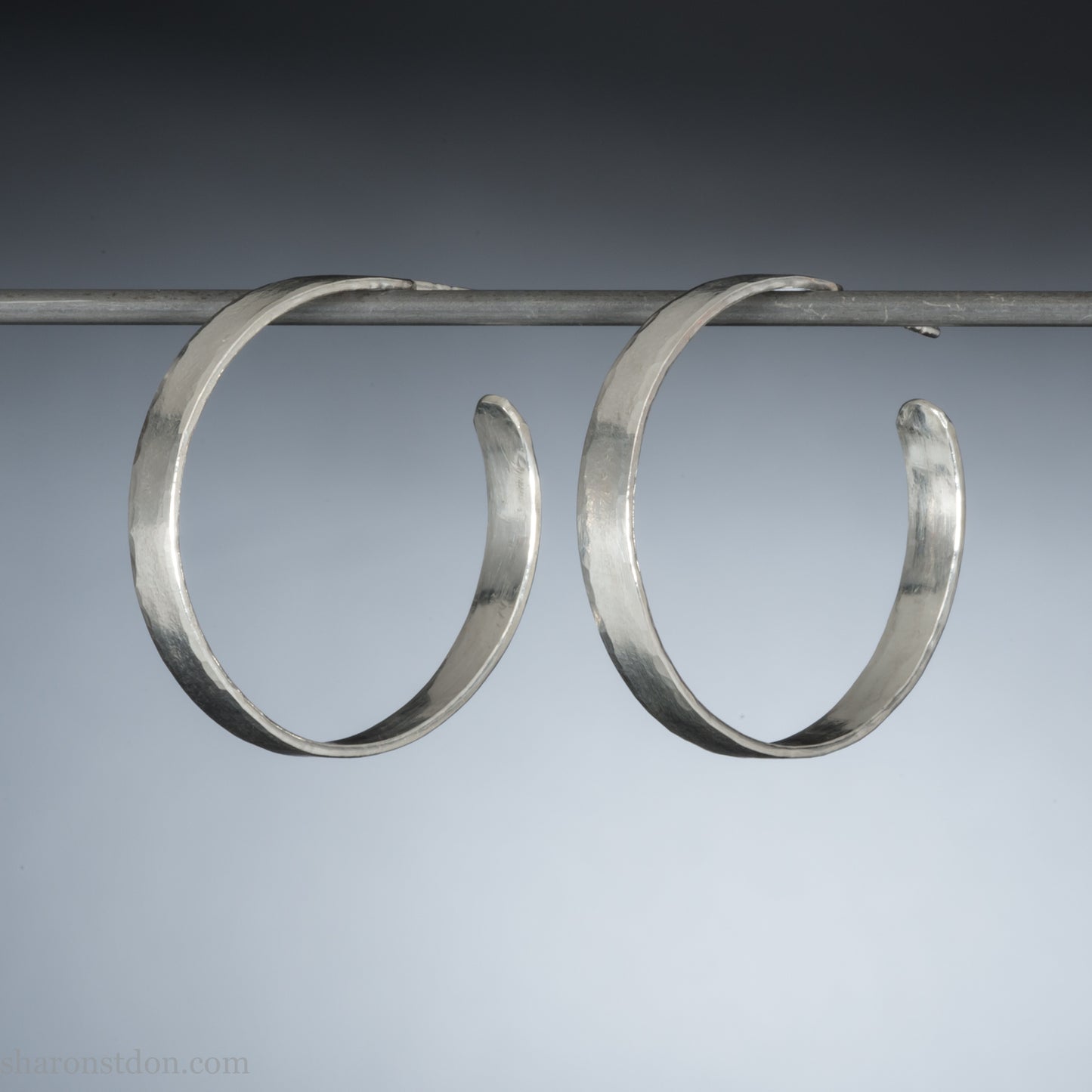 30mm sterling silver hoop earrings with hammered texture, handmade by Sharon Saint Don.