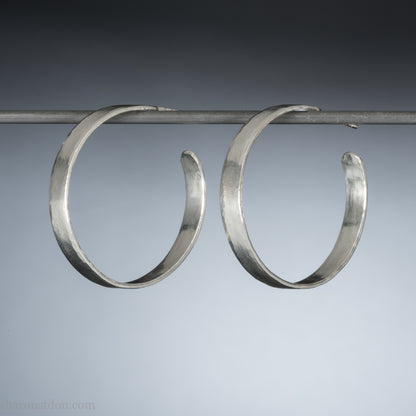 30mm sterling silver hoop earrings with hammered texture, handmade by Sharon Saint Don.