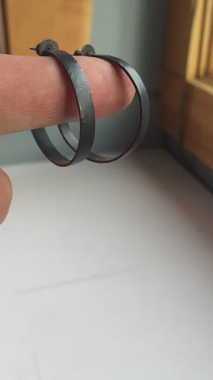 925 sterling silver hoop earrings. 30mm diameter round, 5mm wide, Handmade oxidized black by Sharon SaintDon. Solid Hammered silver with silver posts and backs.