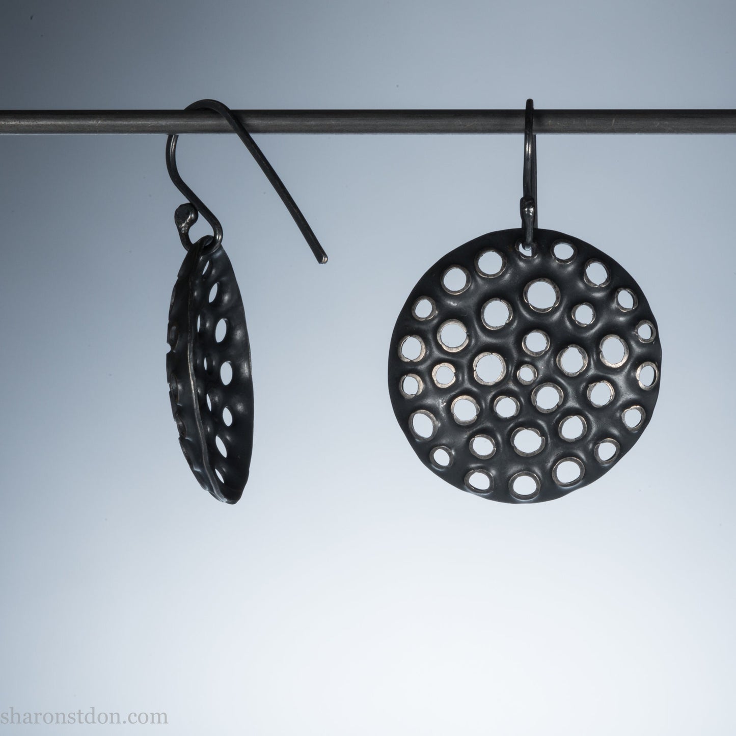 25mm solid 925 sterling silver round disc earrings, hand-punched pattern, flat matte black oxidized finish.