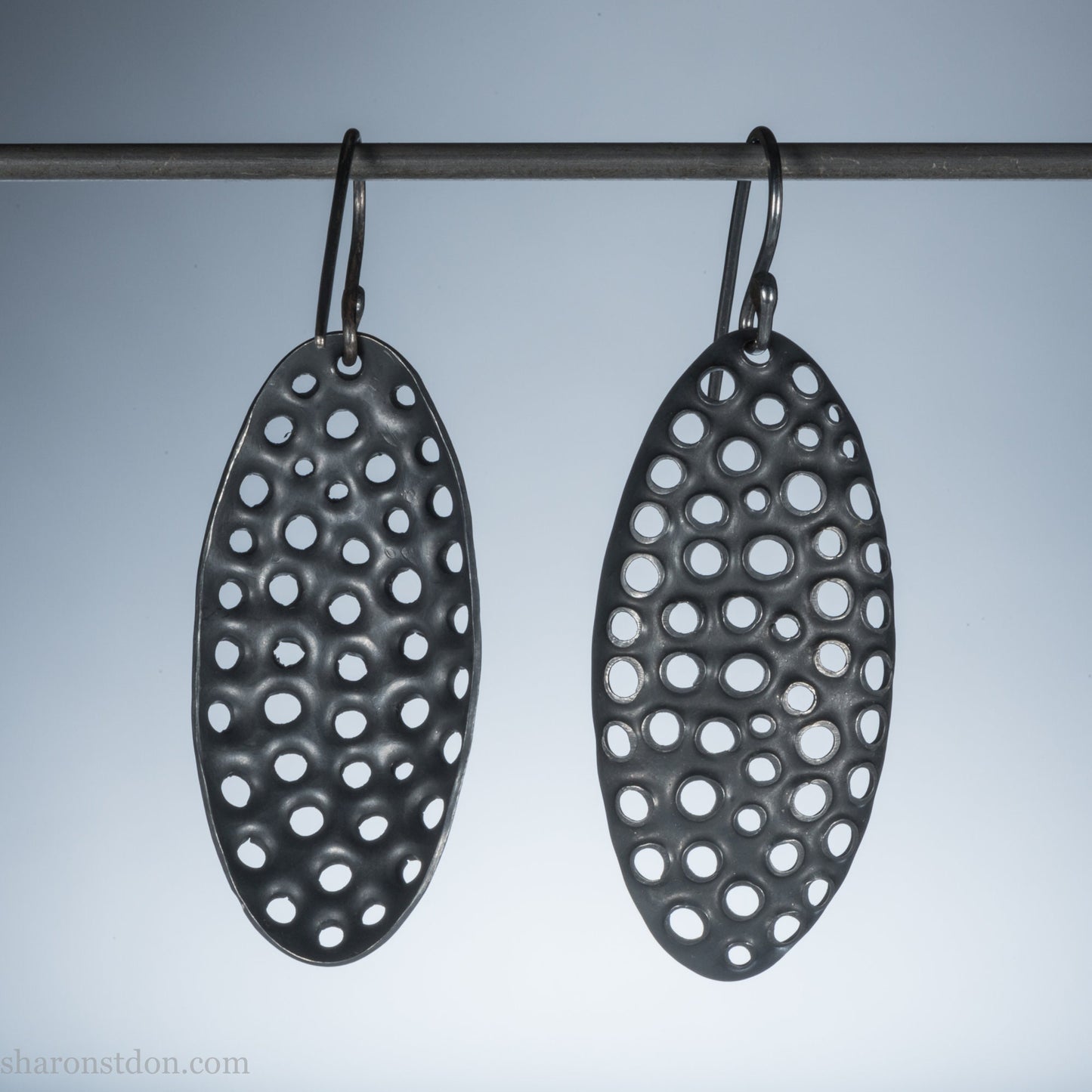 38mm solid 925 sterling silver oval disc earrings, hand-punched pattern, flat matte black oxidized finish, handmade ear wires.