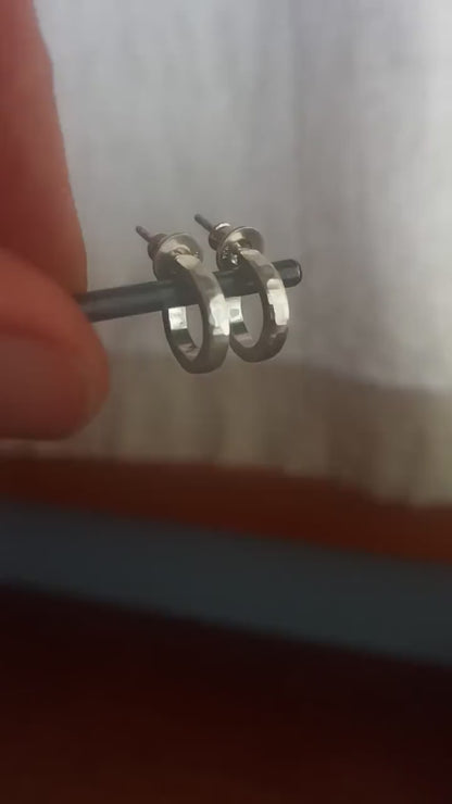 Handcrafted solid sterling silver hoop earrings, with a hammered texture and a matte, brushed, shiny finish. SIZE: 12mm exterior diameter, 9mm interior, 2mm wide. and 1.5mm thick.