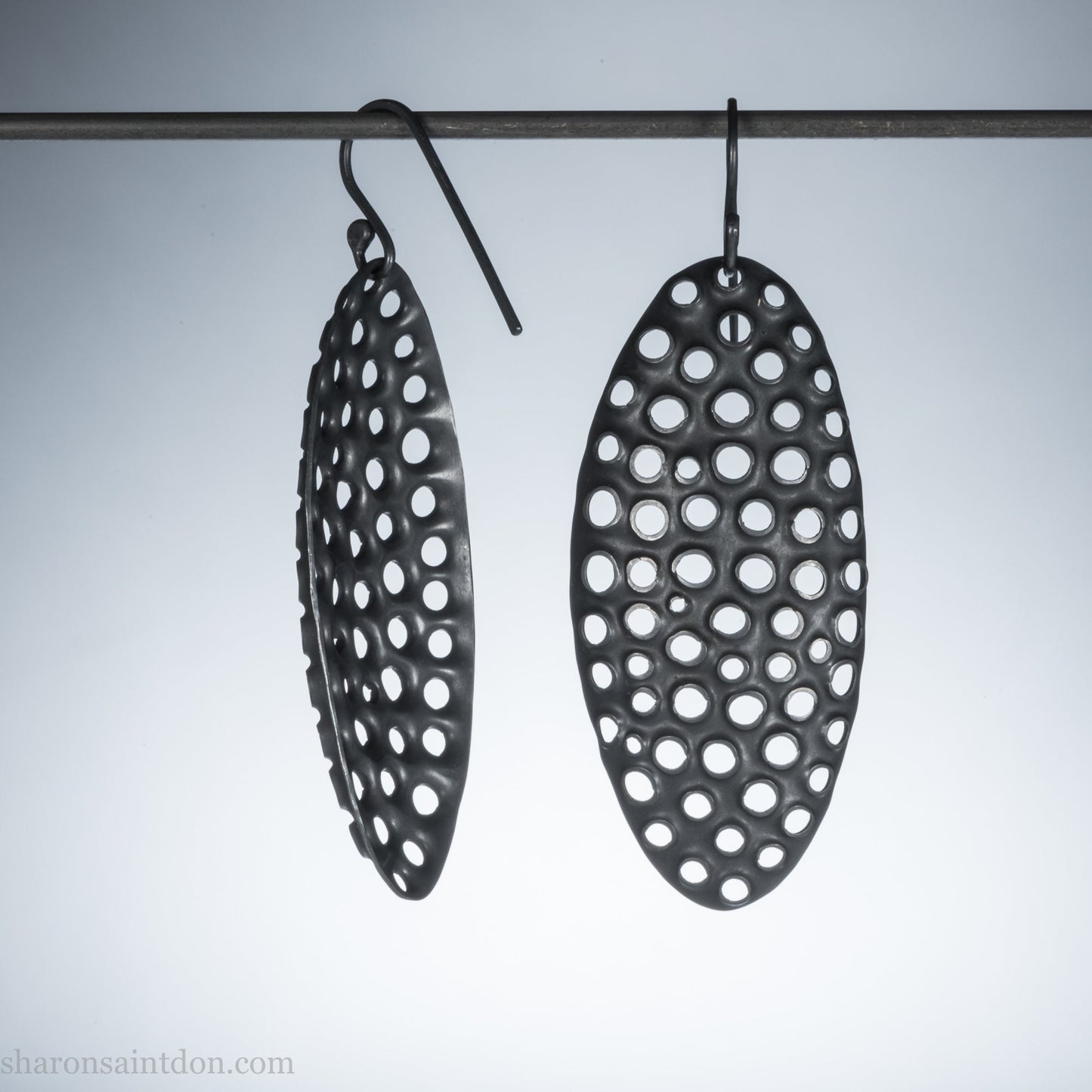 50mm solid 925 sterling silver oval disc earrings, hand-punched pattern, flat matte black oxidized finish, handmade ear wires.