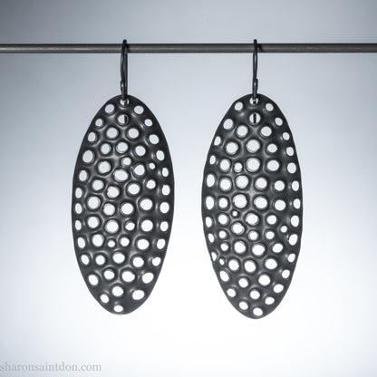 50mm solid 925 sterling silver oval disc earrings, hand-punched pattern, flat matte black oxidized finish, handmade ear wires.