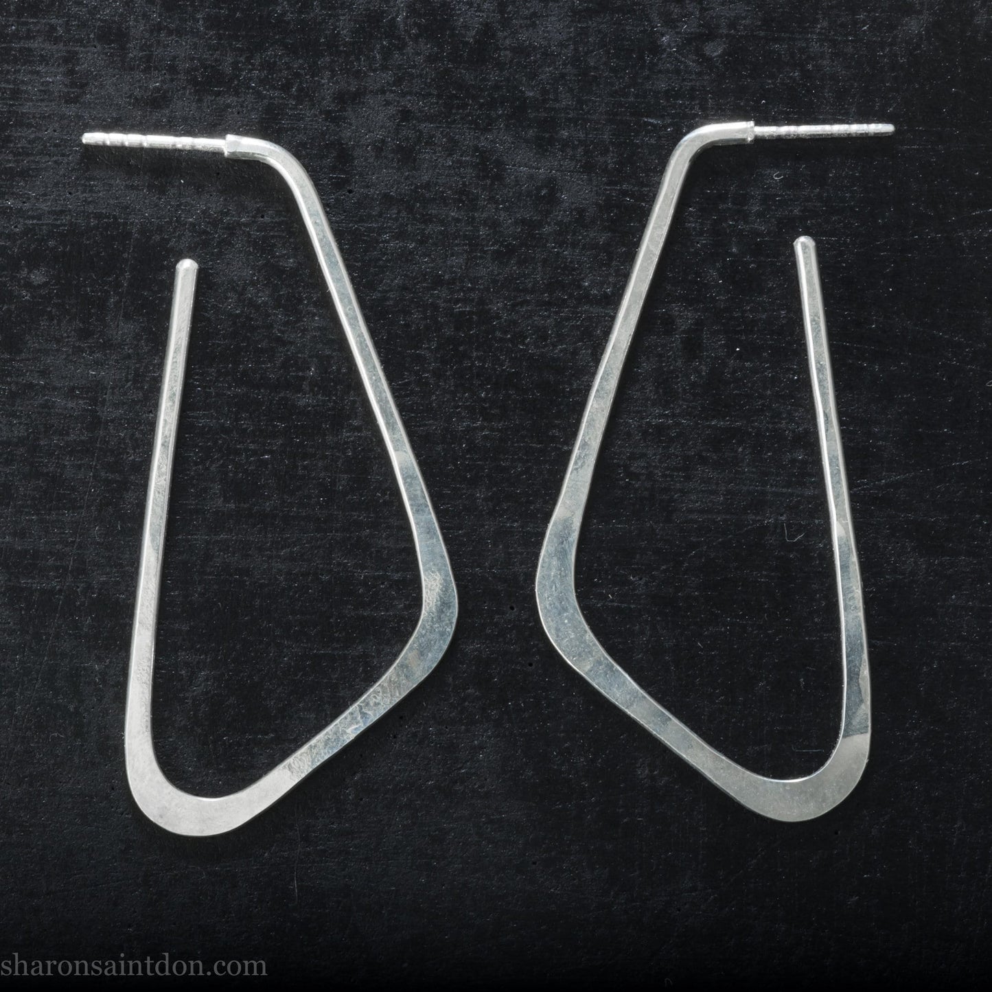 Solid 925 sterling silver hoop earrings, angular low D shape, hand hammered.