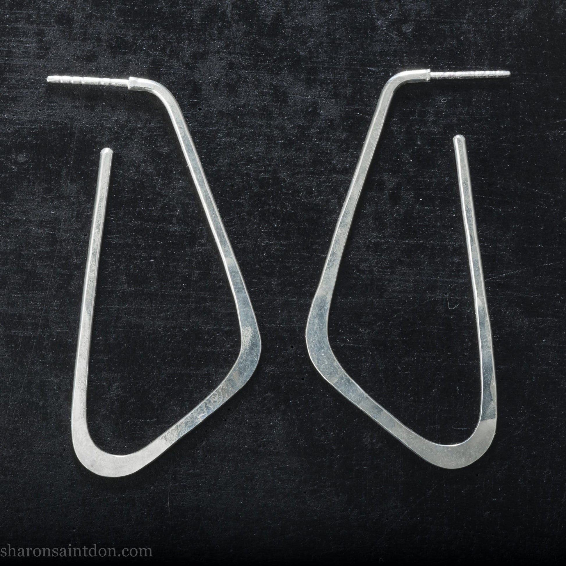 Solid 925 sterling silver hoop earrings, angular low D shape, hand hammered.