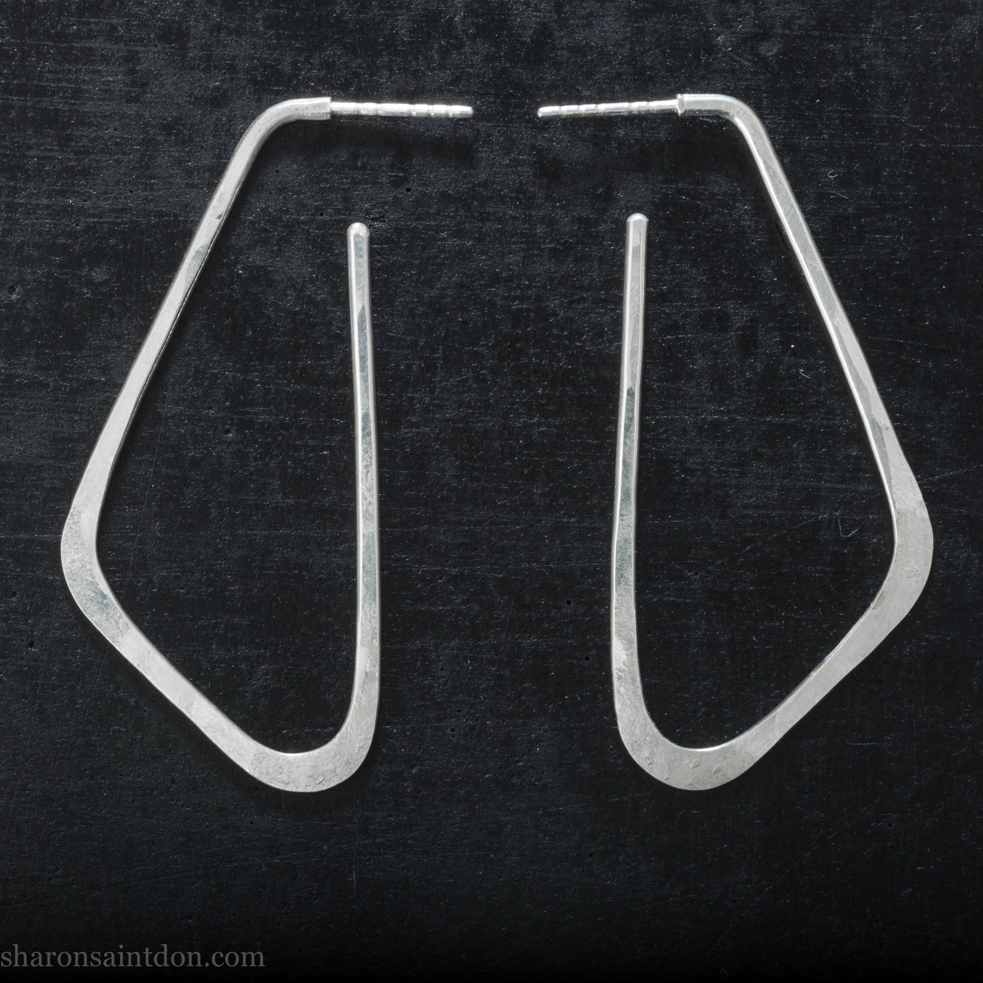Solid 925 sterling silver hoop earrings, angular low D shape, hand hammered.