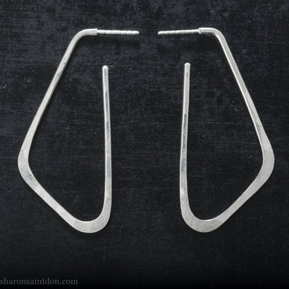 Solid 925 sterling silver hoop earrings, angular low D shape, hand hammered.