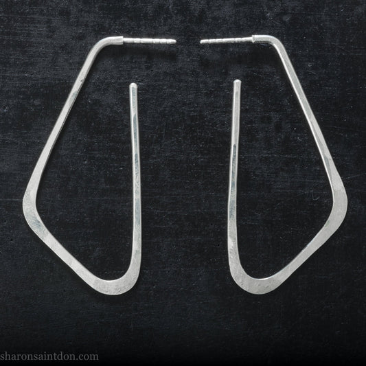 Solid 925 sterling silver hoop earrings, angular low D shape, hand hammered.