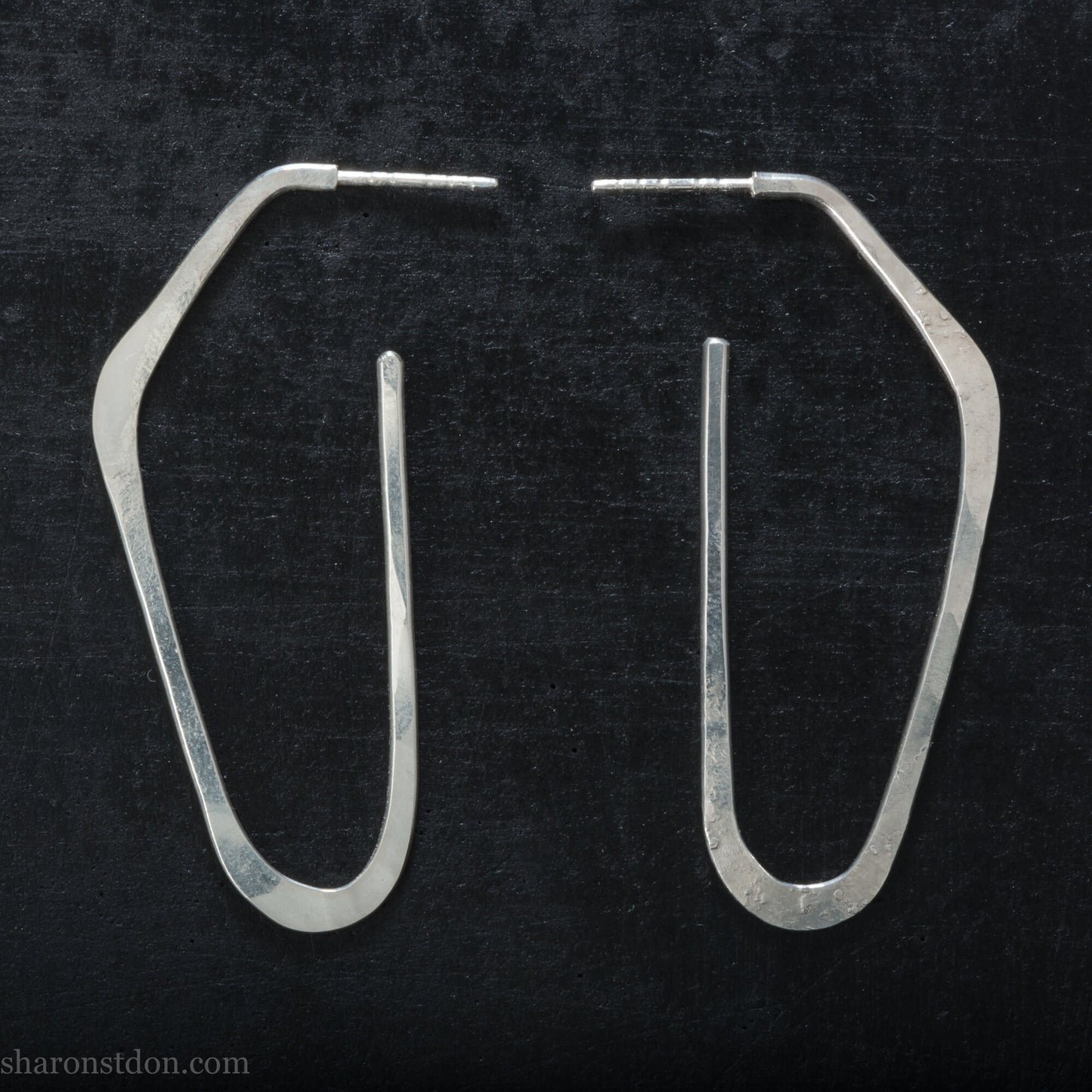 Solid 925 sterling silver hoop earrings, hammered, angular long high D shape. Matte finish.