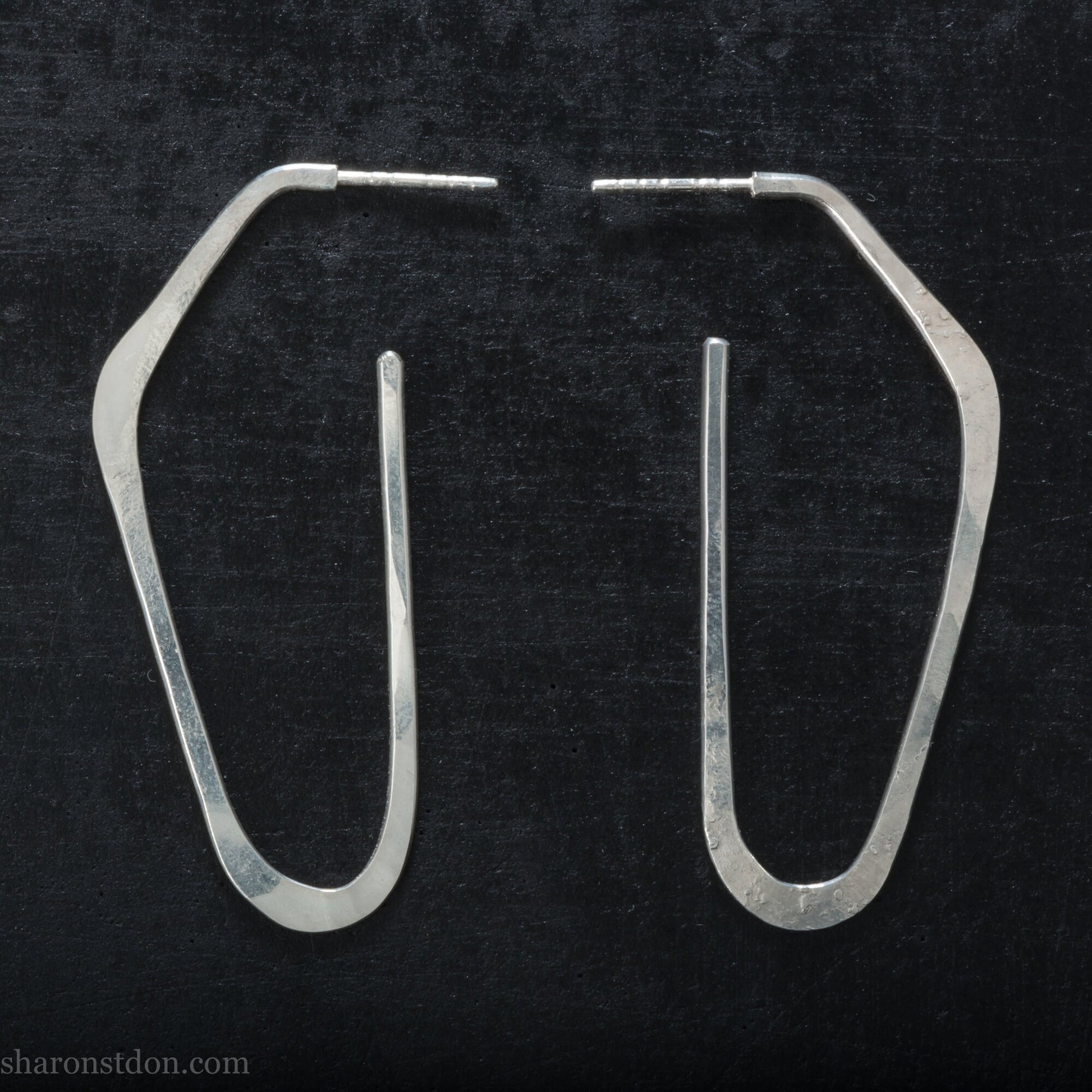 Solid 925 sterling silver hoop earrings, hammered, angular long high D shape. Matte finish.