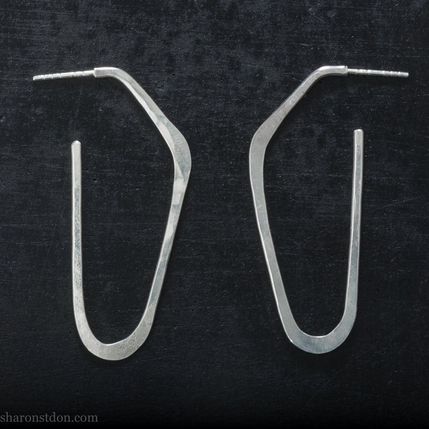 Solid 925 sterling silver hoop earrings, hammered, angular long high D shape. Matte finish.