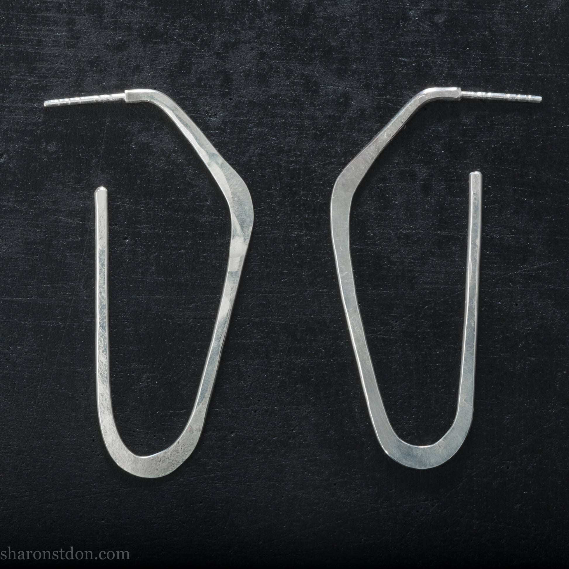 Solid 925 sterling silver hoop earrings, hammered, angular long high D shape. Matte finish.
