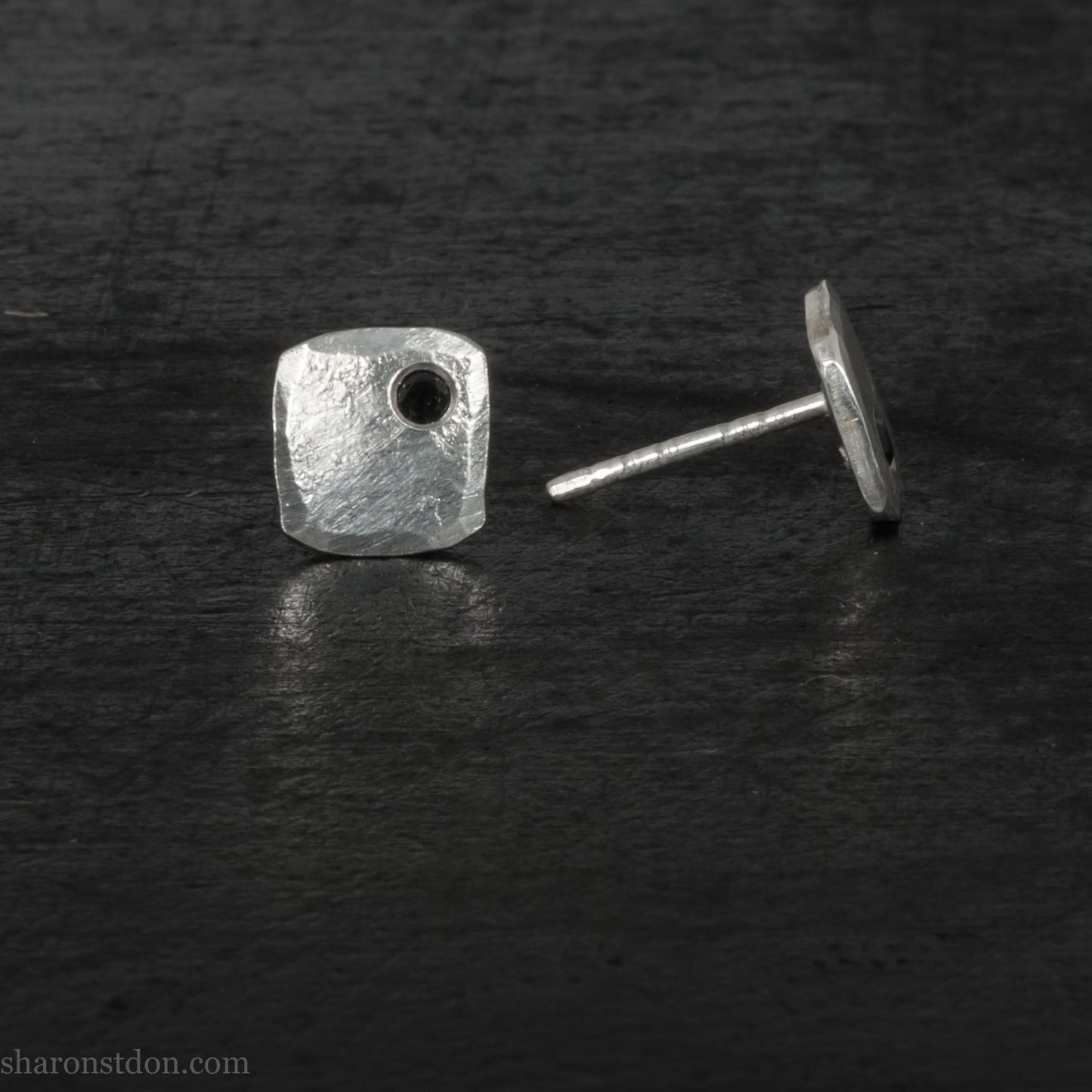 Black spinel stud earrings in sterling silver, 7mm square with matte finish.