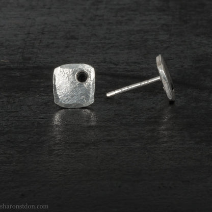 Black spinel stud earrings in sterling silver, 7mm square with matte finish.