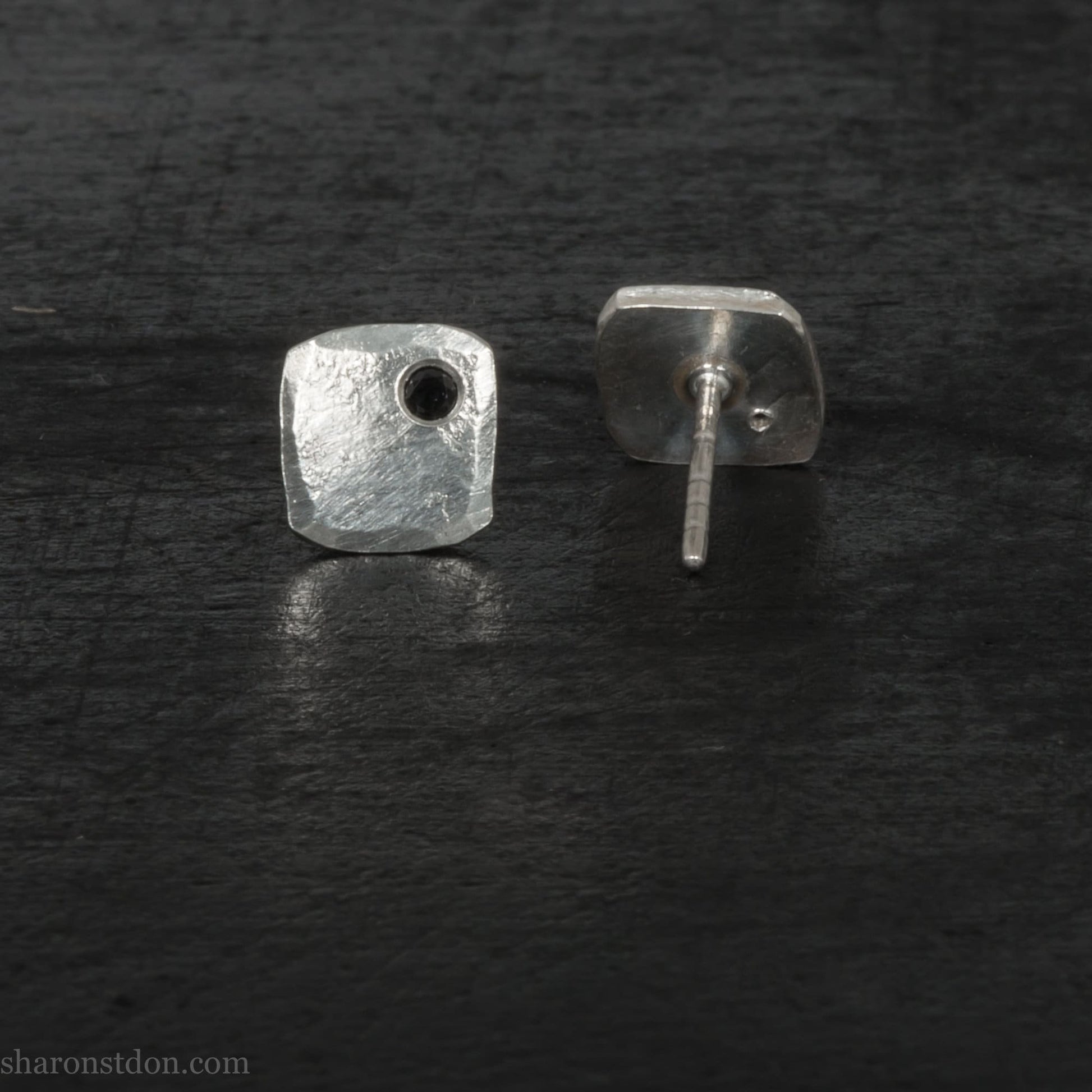 Black spinel stud earrings in sterling silver, 7mm square with matte finish.