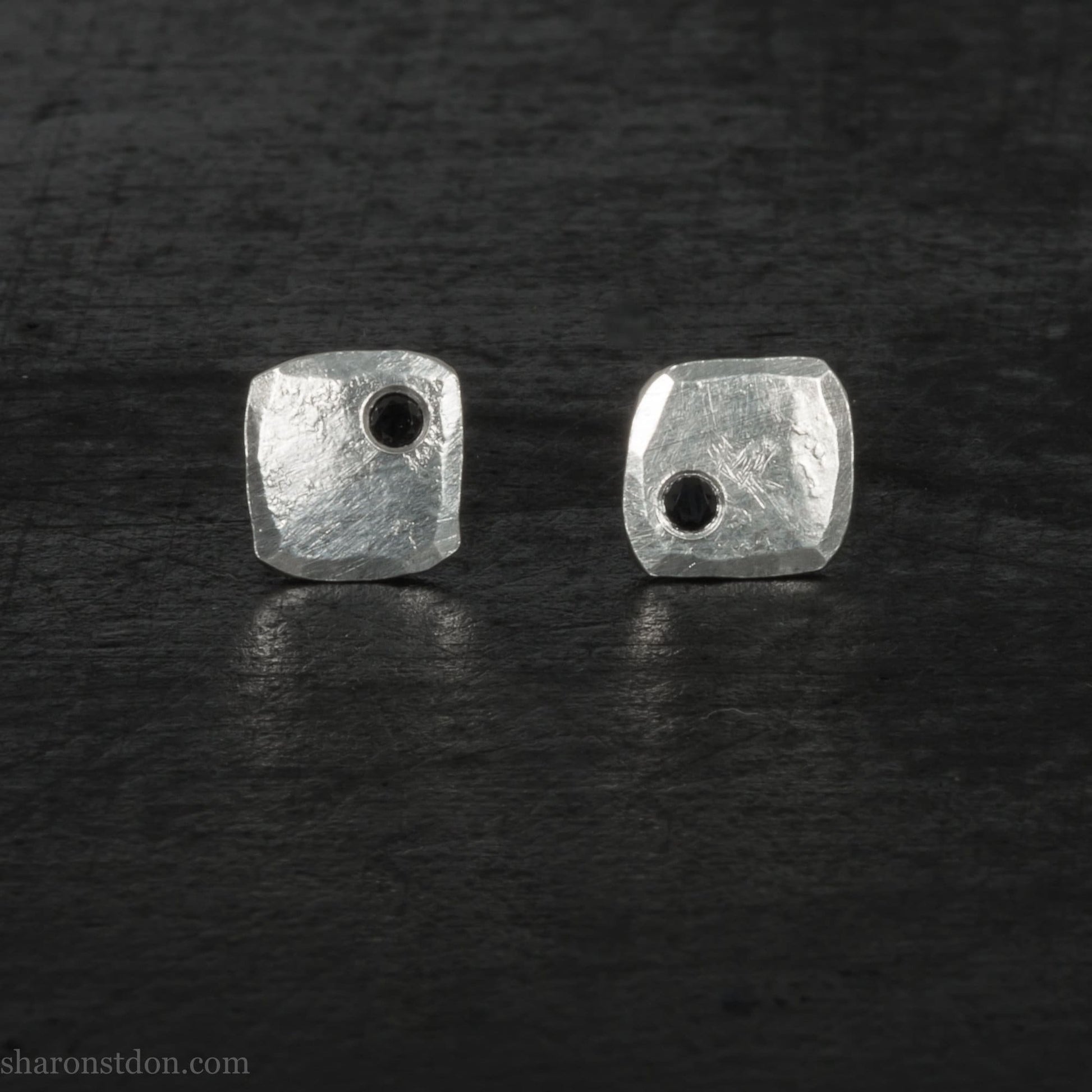 Black spinel stud earrings in sterling silver, 7mm square with matte finish.
