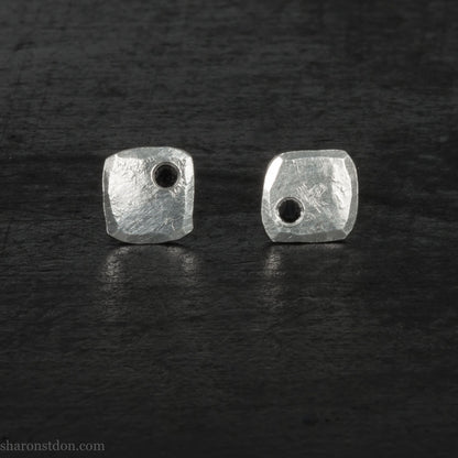 Black spinel stud earrings in sterling silver, 7mm square with matte finish.