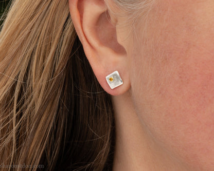 Canary yellow diamond gemstone stud post earrings. Solid 925 sterling silver, 7mm square with a 2mm round diamond flush set in the corner. Handmade by Sharon SaintDon in North America.