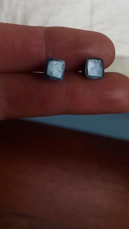 925 sterling silver stud earrings.  7mm square, hammered solid silver, oxidized black with silver posts and backs. Handmade by Sharon SaintDon in North America.