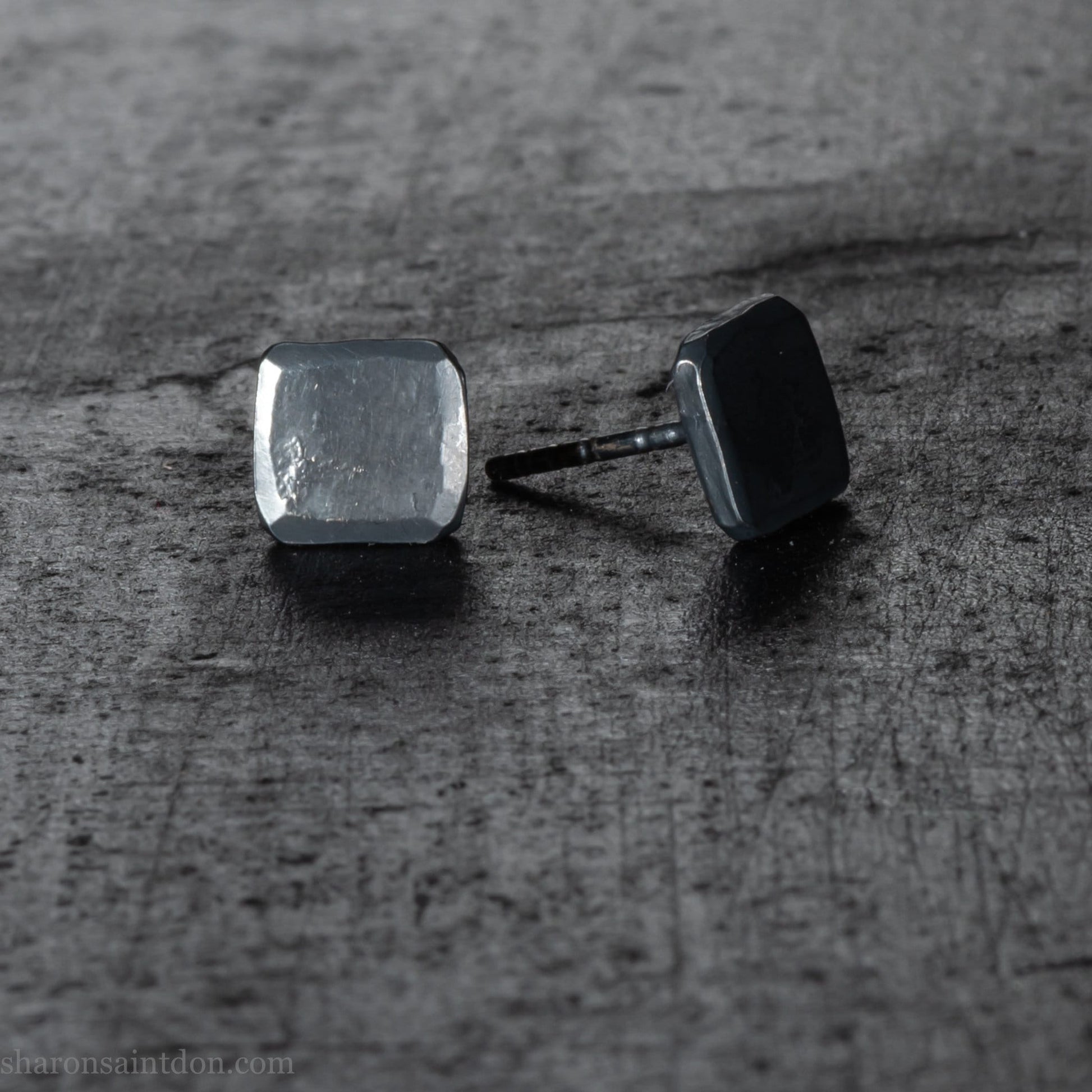 925 sterling silver stud earrings.  7mm square, hammered solid silver, oxidized black with silver posts and backs. Handmade by Sharon SaintDon in North America.