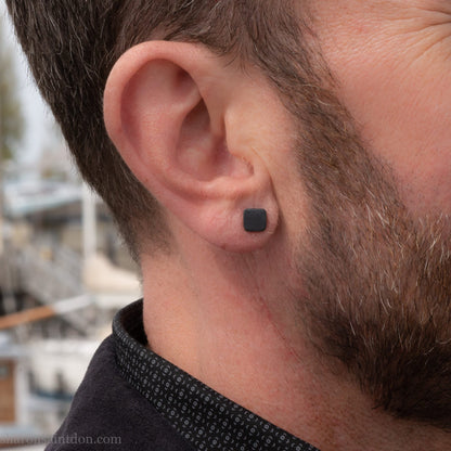 925 sterling silver stud earrings.  7mm square, hammered solid silver, oxidized black with silver posts and backs. Handmade by Sharon SaintDon in North America.