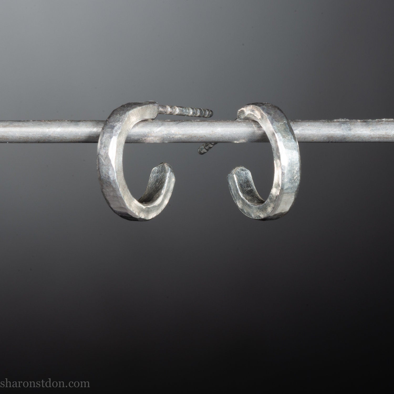 Handmade solid sterling silver hoop earrings, hammered by hand with a matte, brushed, shiny finish. SIZE: 12mm exterior diameter, 9mm interior, 2mm wide. and 1.5mm thick.