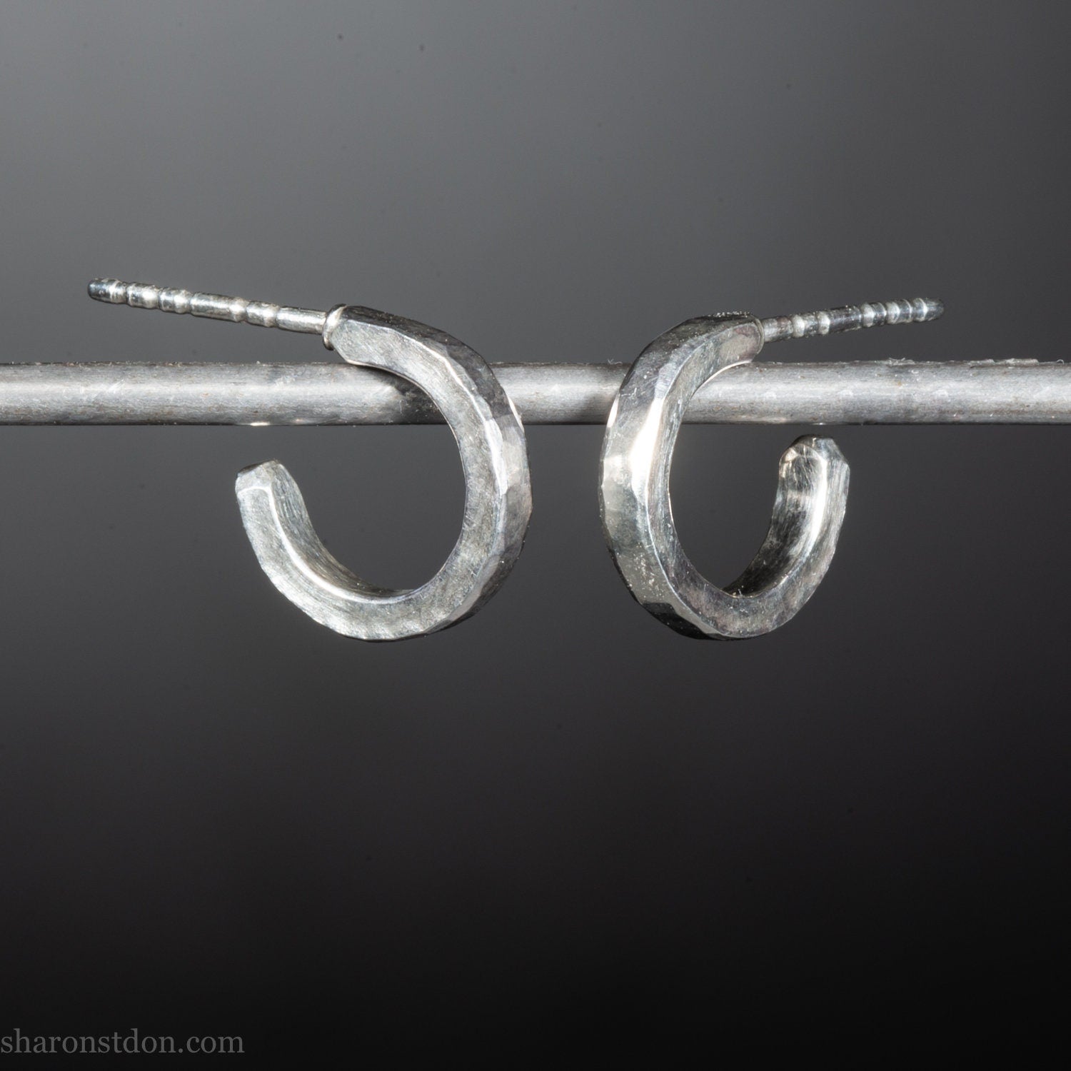 Handmade solid sterling silver hoop earrings, hammered by hand with a matte, brushed, shiny finish. SIZE: 12mm exterior diameter, 9mm interior, 2mm wide. and 1.5mm thick.