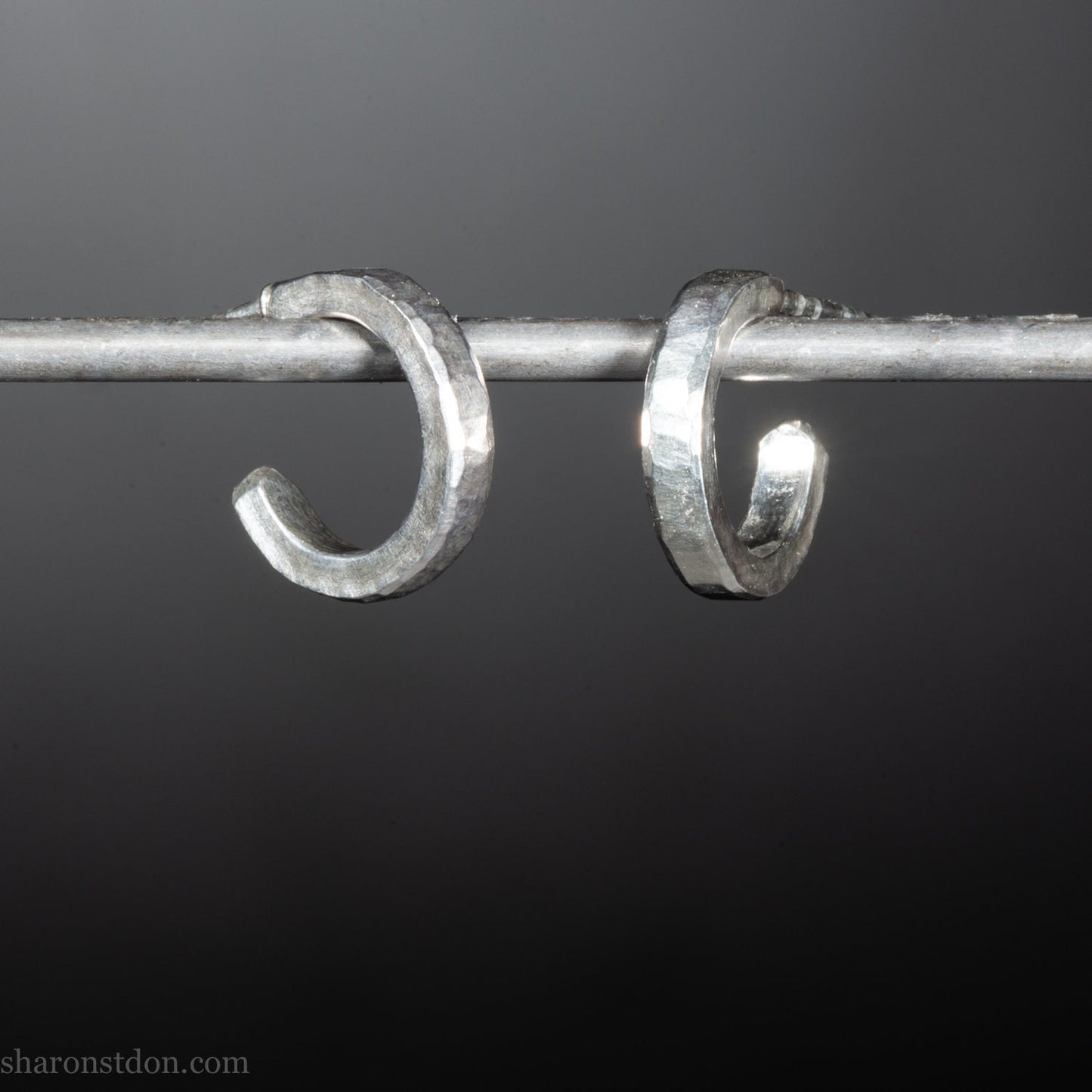 Handmade solid sterling silver hoop earrings, hammered by hand with a matte, brushed, shiny finish. SIZE: 12mm exterior diameter, 9mm interior, 2mm wide. and 1.5mm thick.