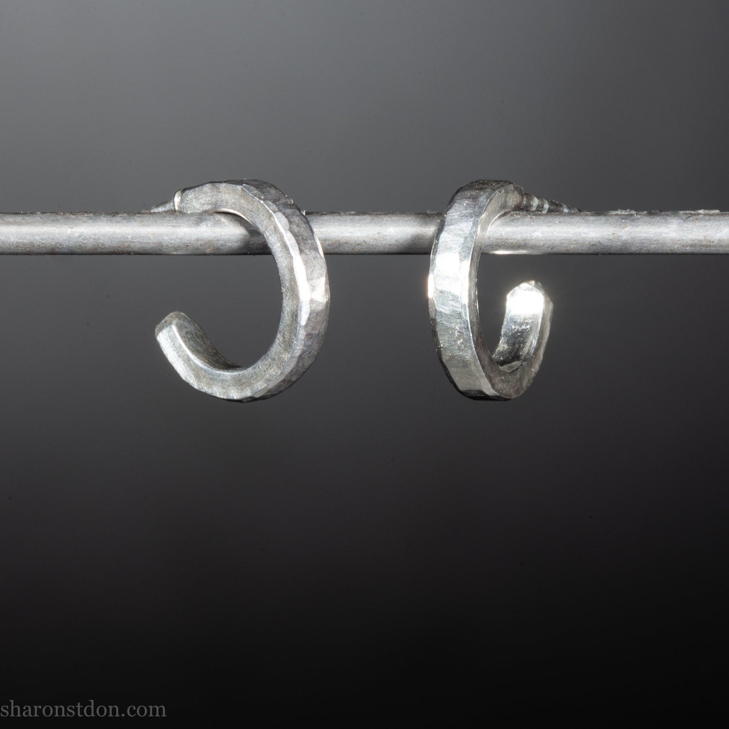Handmade solid sterling silver hoop earrings, hammered by hand with a matte, brushed, shiny finish. SIZE: 12mm exterior diameter, 9mm interior, 2mm wide. and 1.5mm thick.