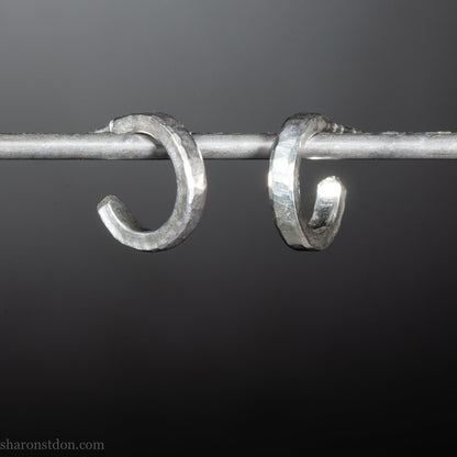 Handmade 12mm sterling silver hoop earrings with a hammered matte brushed finish.