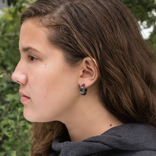 18mm x 4mm oxidized black 925 sterling silver hoop earrings, handmade in North America by Sharon SaintDon for men or women.