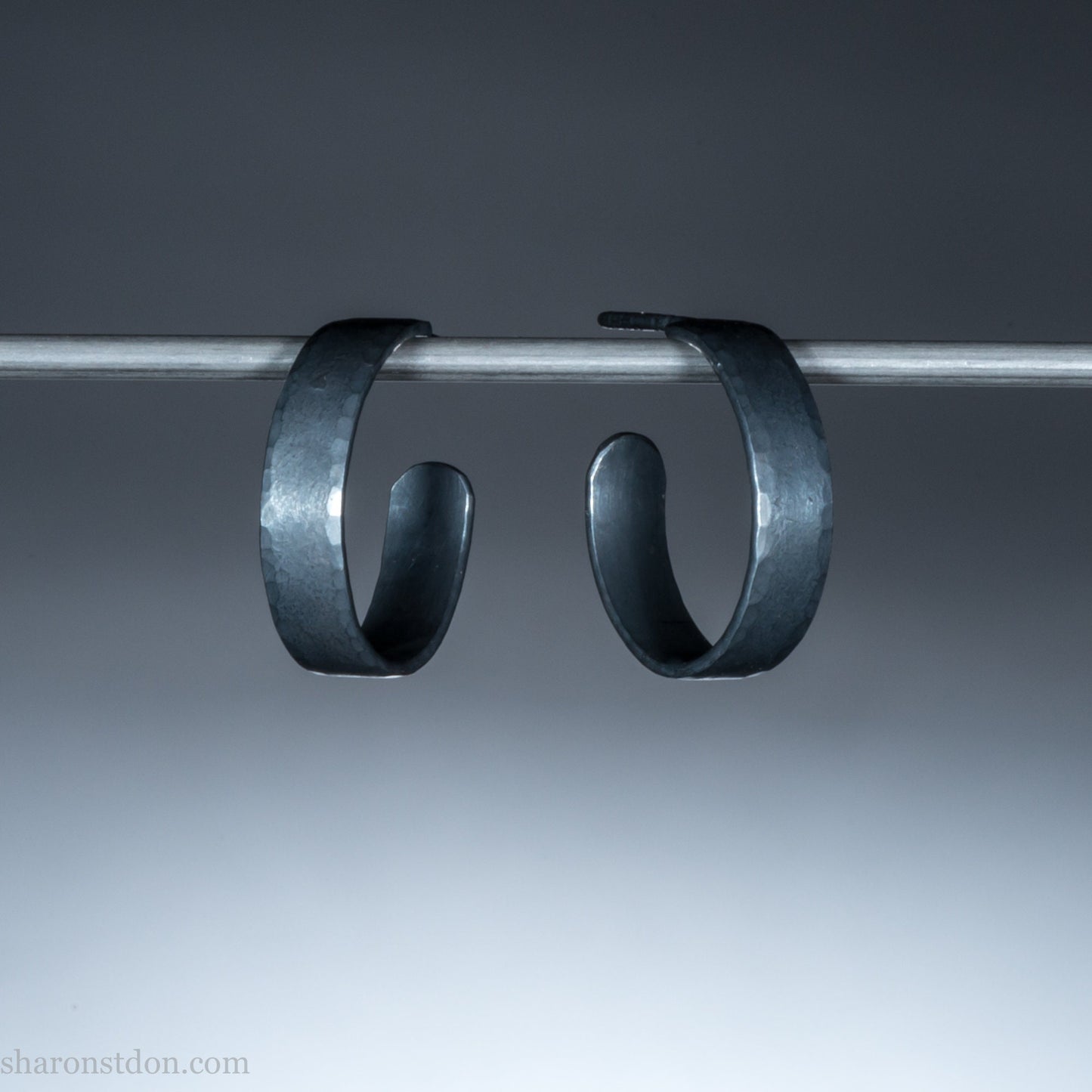 18mm x 4mm oxidized black 925 sterling silver hoop earrings, handmade in North America by Sharon SaintDon for men or women.