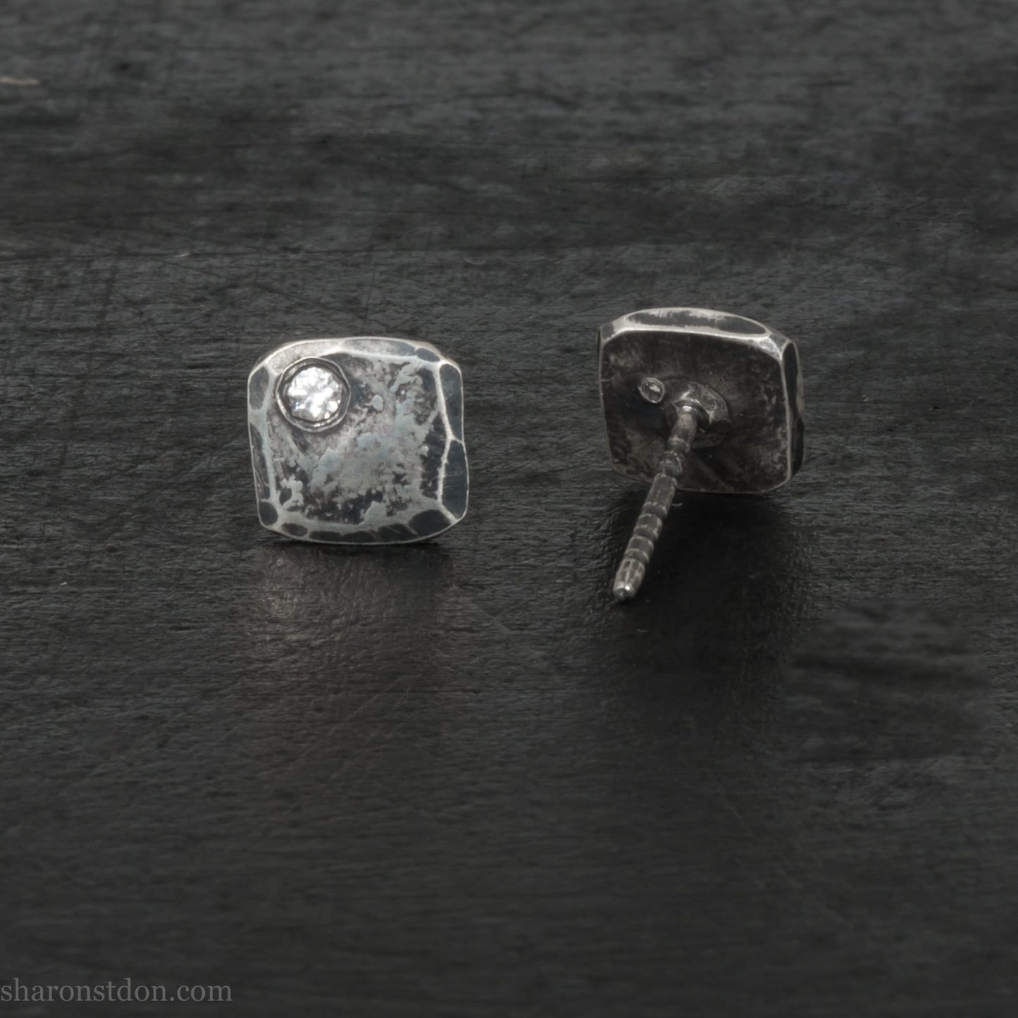 7mm square, handmade 925 sterling silver stud earrings with Canadamark brand Canadian diamond in the corner. Dark, antique finish, Handmade by Sharon SaintDon in North America.